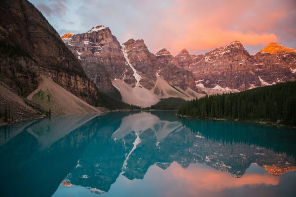 Lake with mountains in background